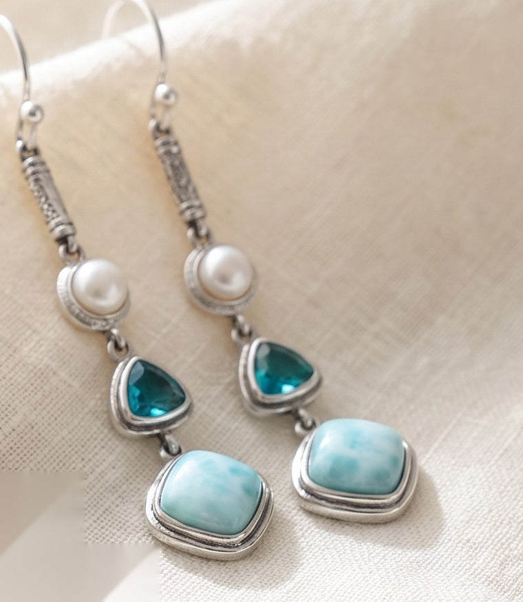 Boucles d'oreilles de l'ensemble Larimar : perle, topaze bleue et larimar, argent 925