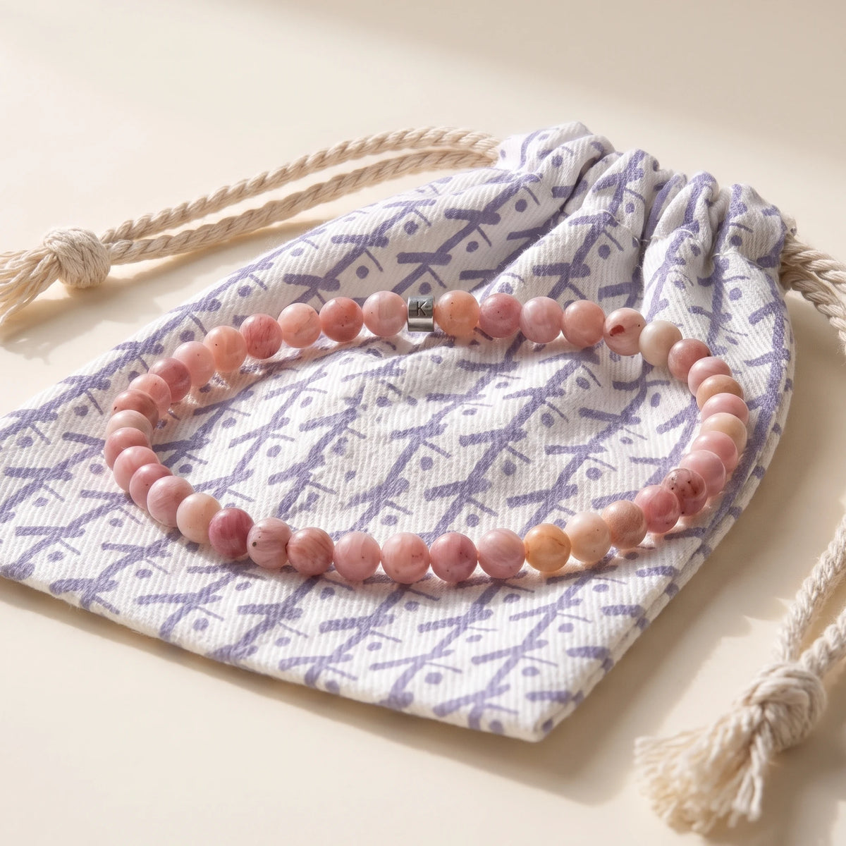 Mini Bracelet en Rhodonite Claire Energie - pochette